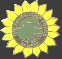Our club button denotes our Kansas State Flower, the Sunflower.