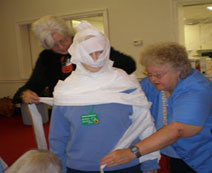 Georgia being mummy wrapped